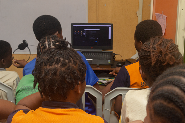 Sacred Touch Student in the tech lab