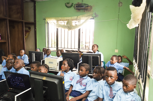 Sacred Touch Student in the tech lab